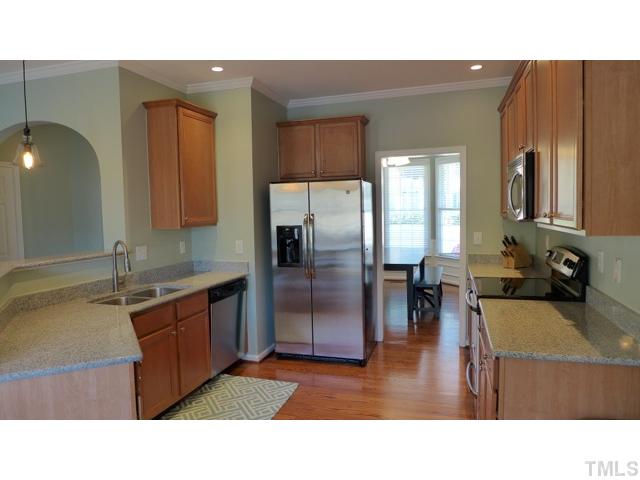 2 Sydenham Road Durham, NC 27713 - Photo 5 of 17 The wonderful cook's Kitchen boasts granite counters, stainless appliances, and maple cabinetry.