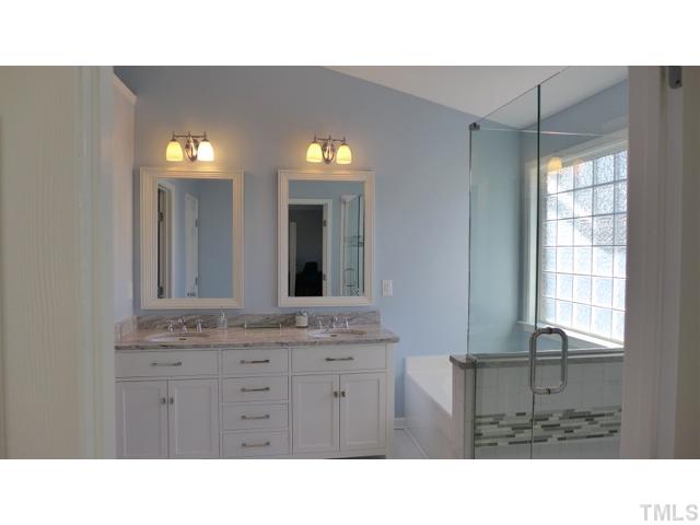 2 Sydenham Road Durham, NC 27713 - Photo 10 of 17 The Master Bath has been completely renovated! Granite, custom tile, expanded shower, plus vaulted ceiling, large soaking tub with glass block window above, and Euro vanities.