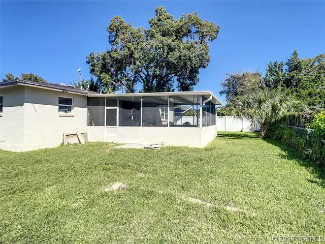 a house view with a garden space