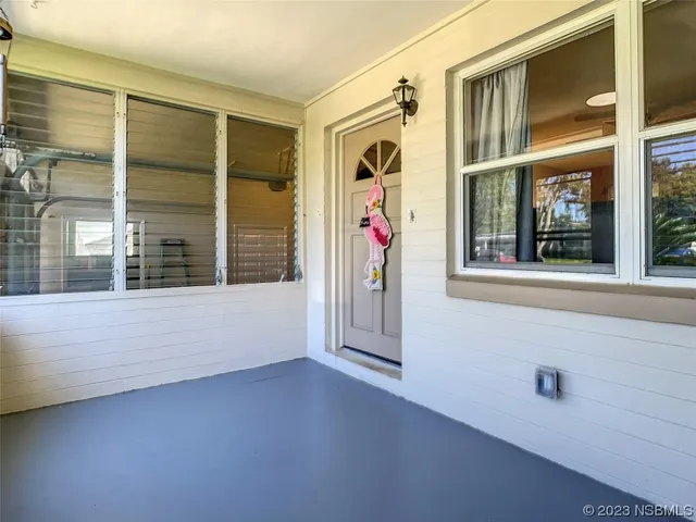 a view of an entryway with a window