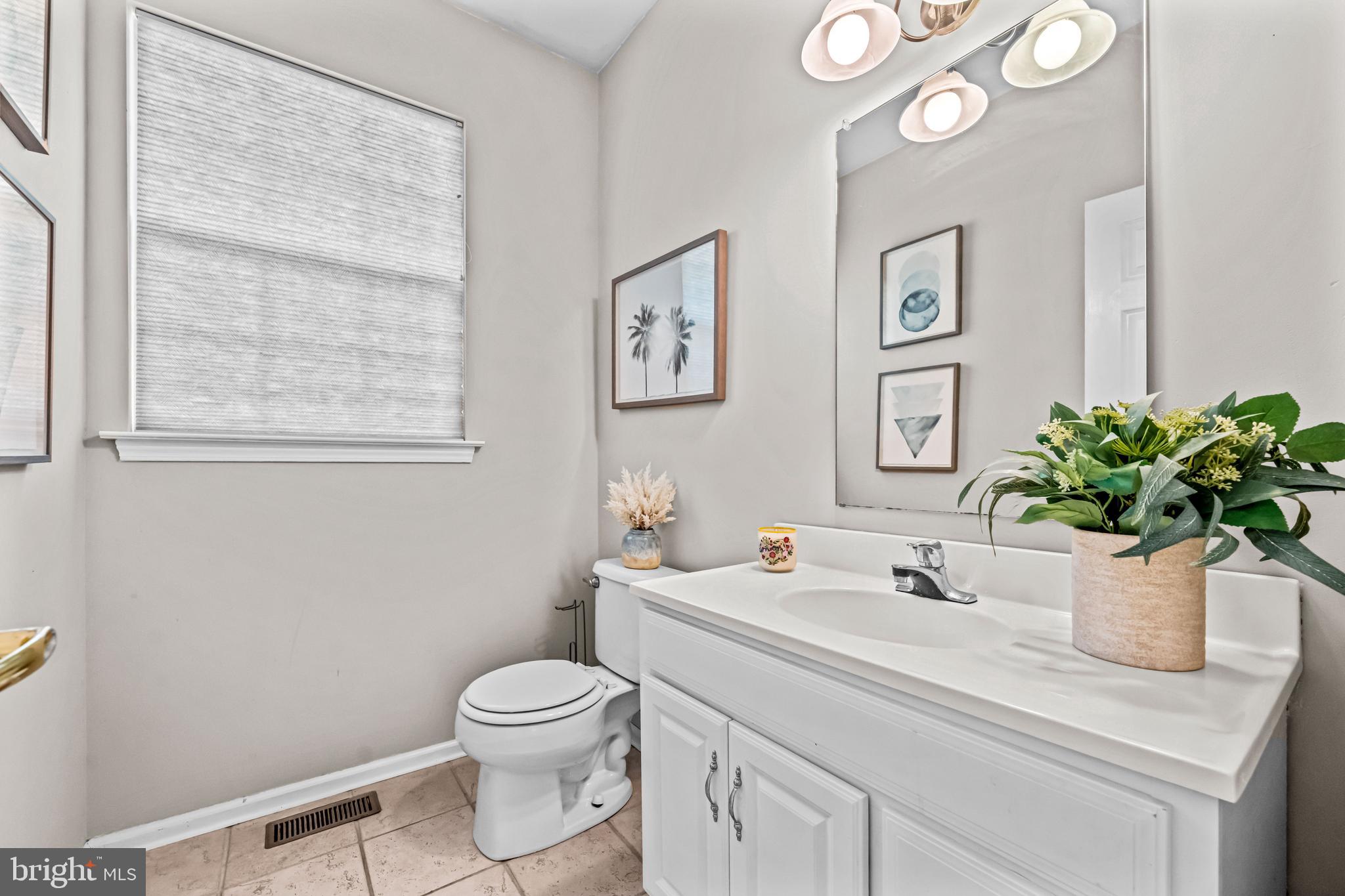 1720 Hampton Drive Jamison, PA 18929 - Photo 14 of 41 a bathroom with a toilet sink and mirror