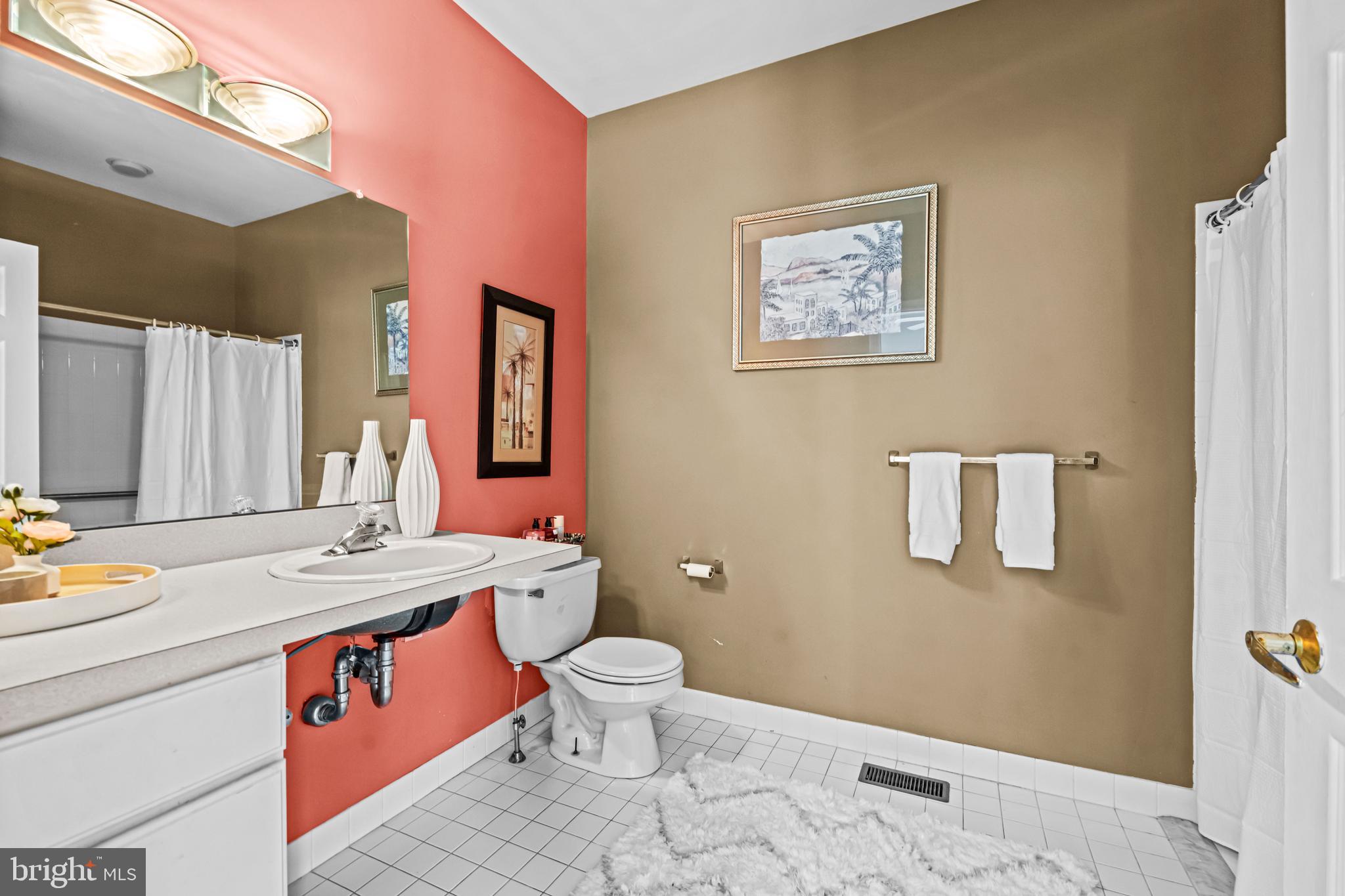 1720 Hampton Drive Jamison, PA 18929 - Photo 17 of 41 a bathroom with a granite countertop toilet sink and mirror