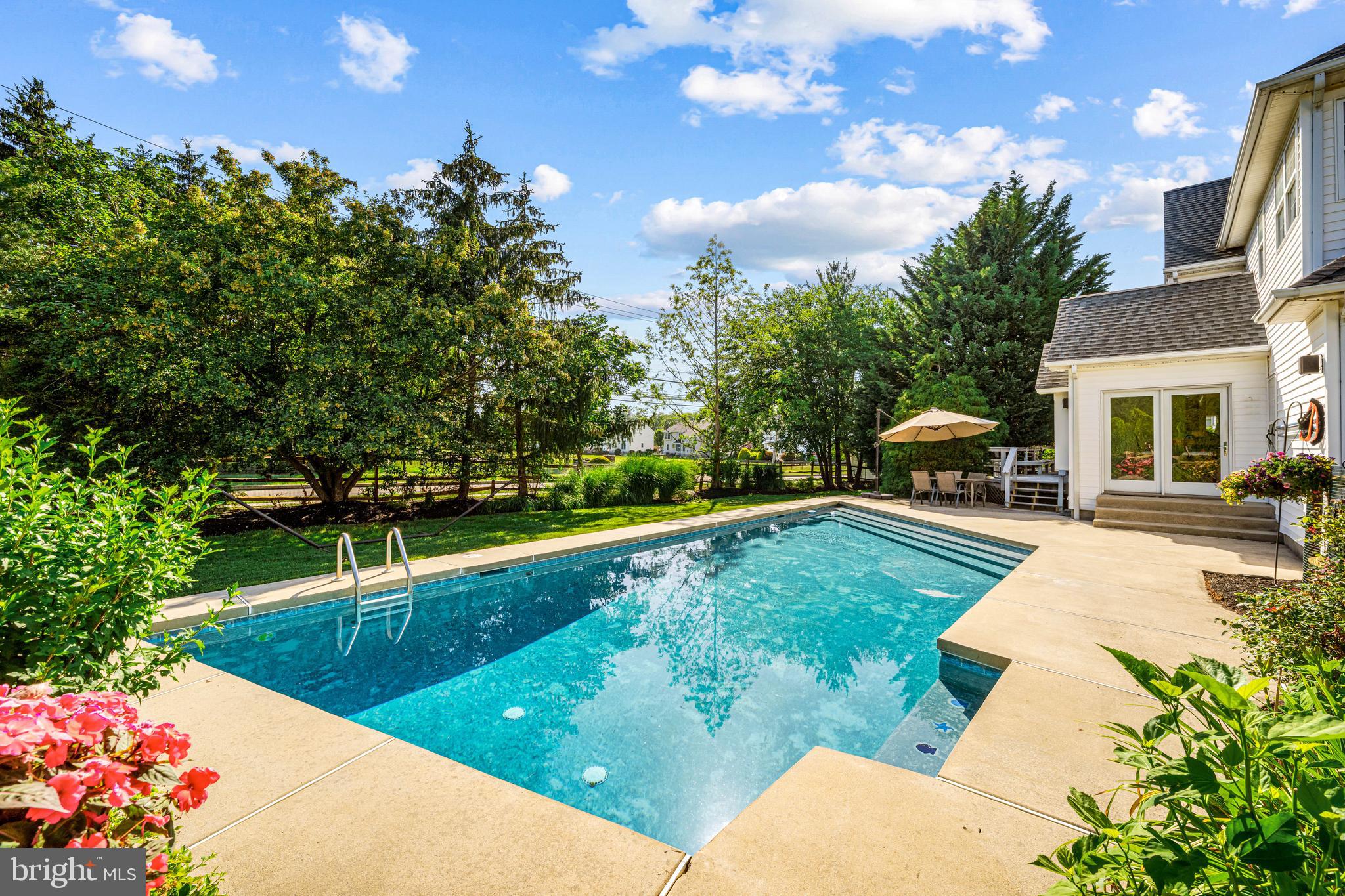 1720 Hampton Drive Jamison, PA 18929 - Photo 2 of 41 a view of a swimming pool with a patio