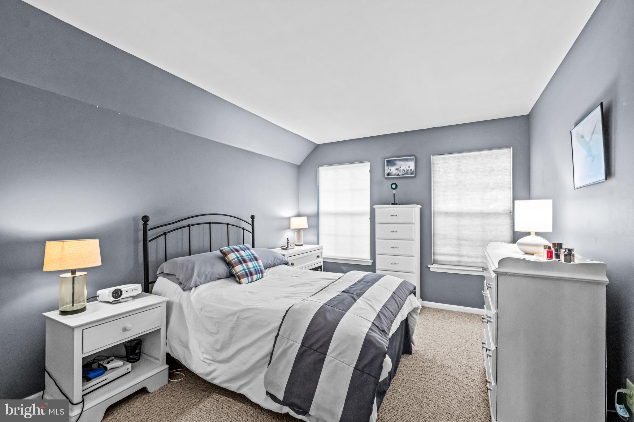 1720 Hampton Drive Jamison, PA 18929 - Photo 27 of 41 a bedroom with a bed and a dresser next to a window