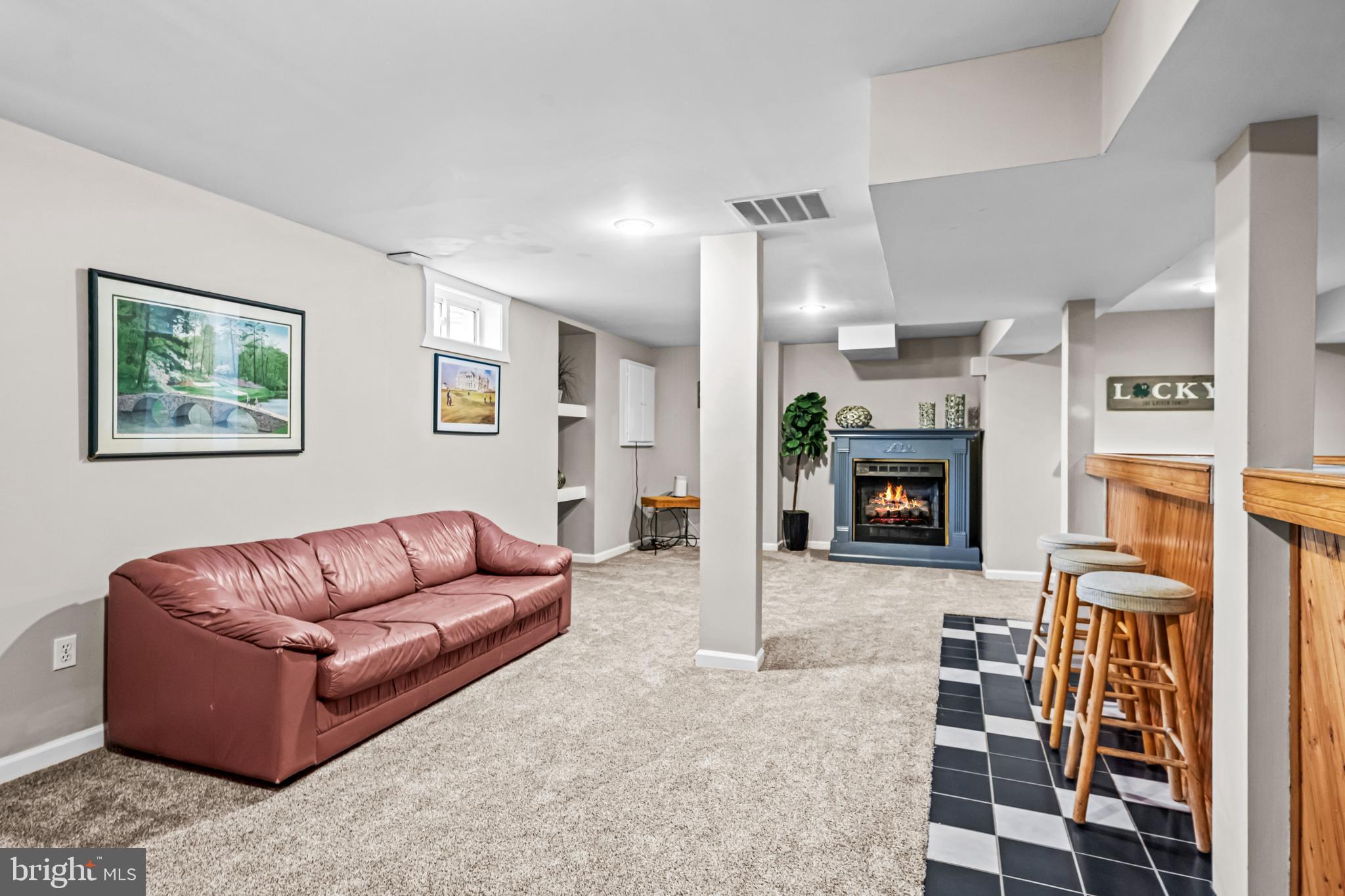 1720 Hampton Drive Jamison, PA 18929 - Photo 31 of 41 a living room with furniture and a fireplace