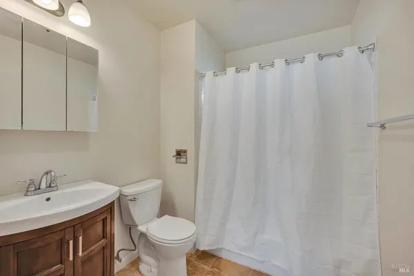 a bathroom with a sink and a toilet