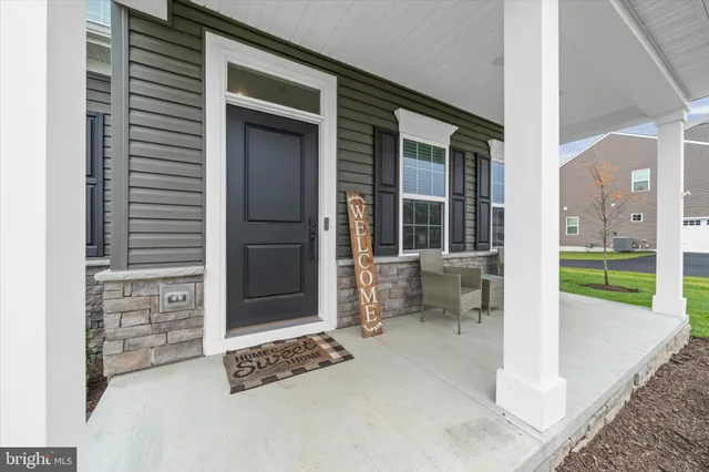 a view of a living room and dining room