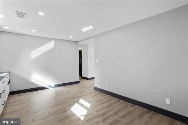 a view of livingroom with wooden floor