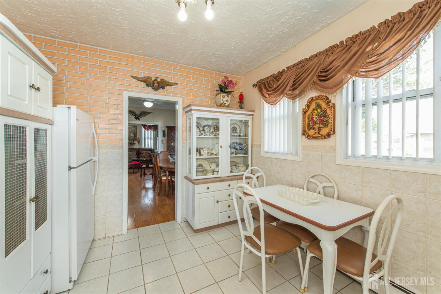 4 Lefferts Street Carteret, NJ 07008 - Photo 15 of 32 a spacious bathroom with a sink a mirror and a shower
