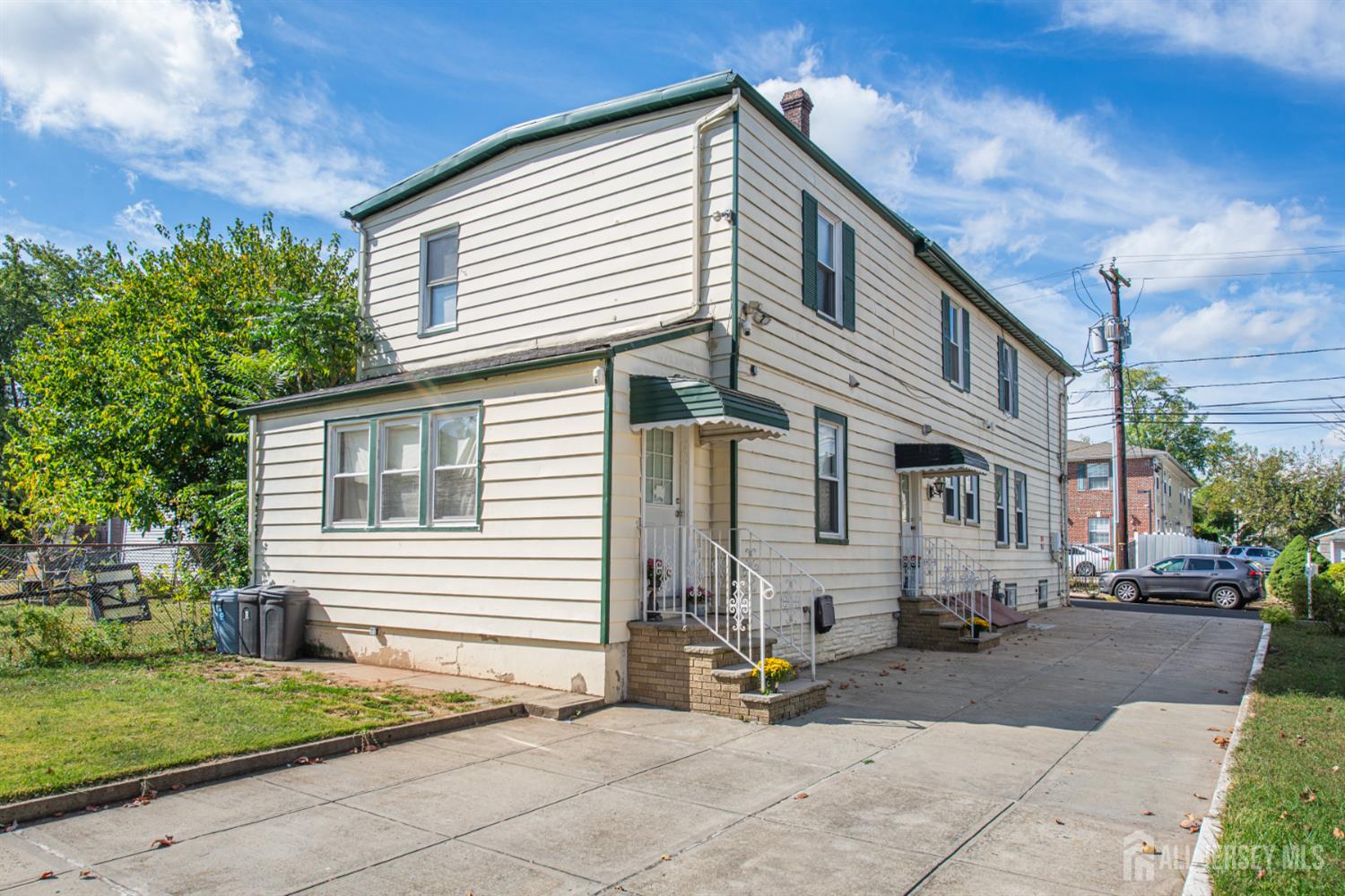 4 Lefferts Street Carteret, NJ 07008 - Photo 3 of 32 a view of a house with a patio