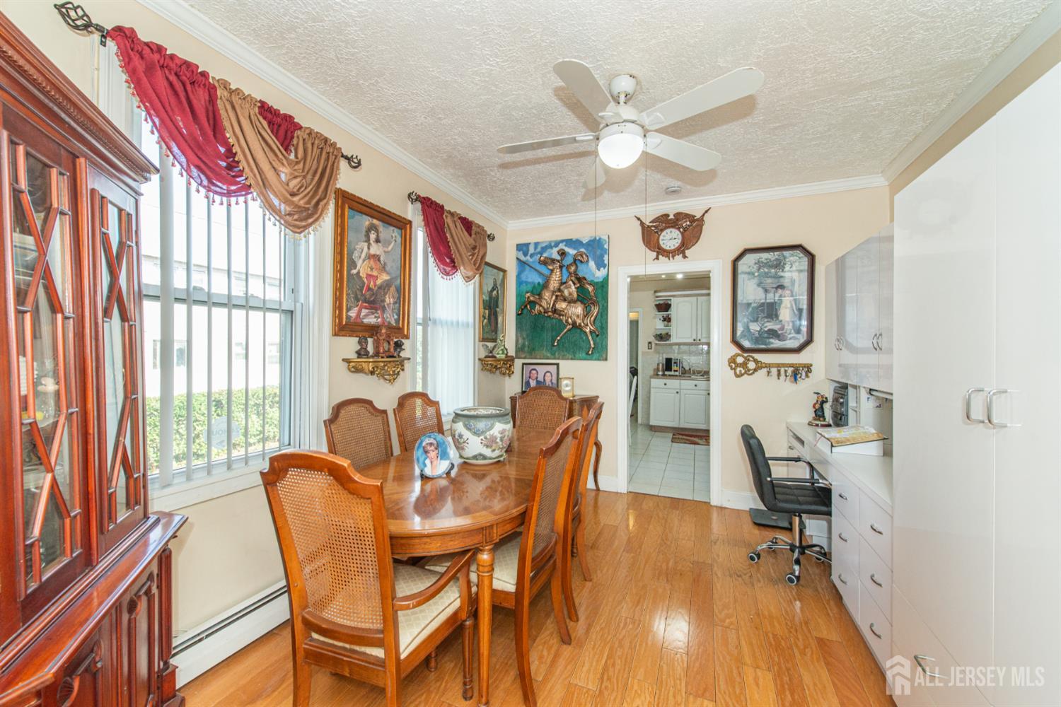 4 Lefferts Street Carteret, NJ 07008 - Photo 8 of 32 a view of a dining room with furniture window and wooden floor