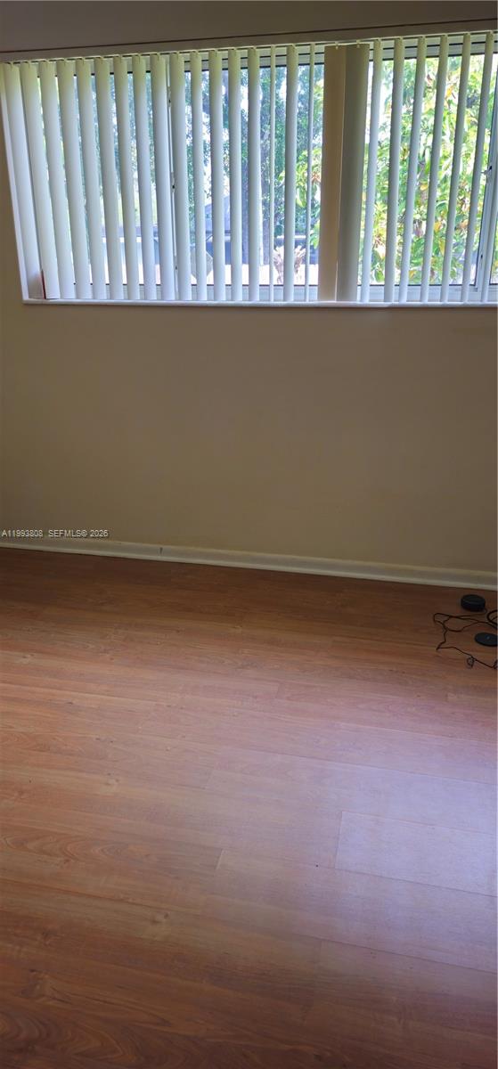 7321 Southwest 123rd Street Pinecrest, FL 33156 - Photo 7 of 7 a view of wooden floor