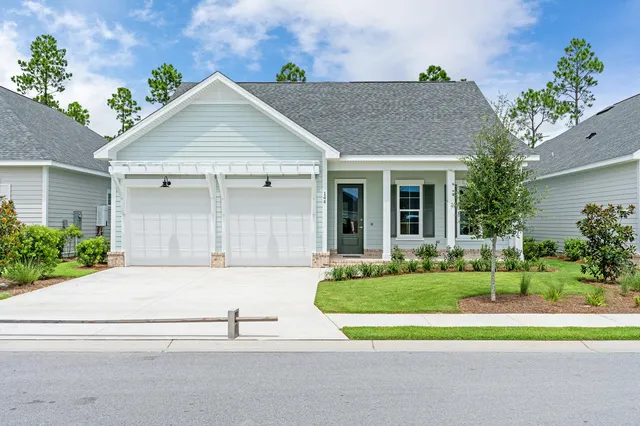 a house view with a garden space