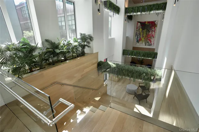 a vase of flowers sitting on a floor