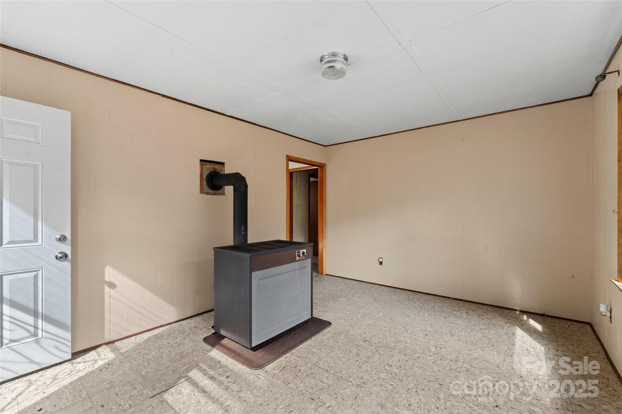 10999 Rush Fork Road Clyde, NC 28721 - Photo 13 of 38 a view of an empty room