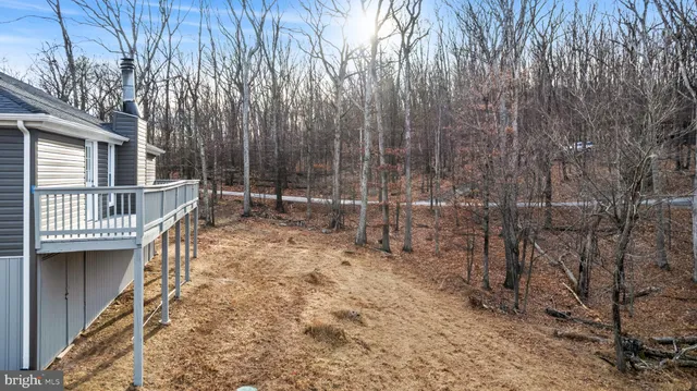 a view of front door with wooden floor