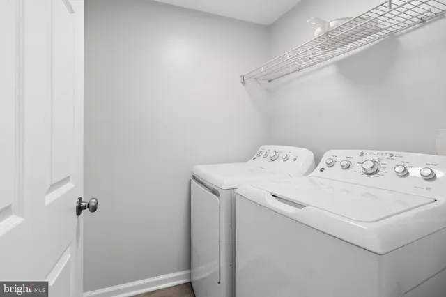 a kitchen with stainless steel appliances granite countertop a stove and cabinets