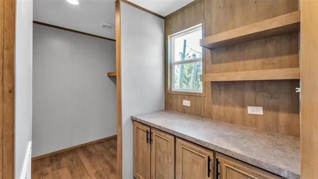 a kitchen with a sink and a window