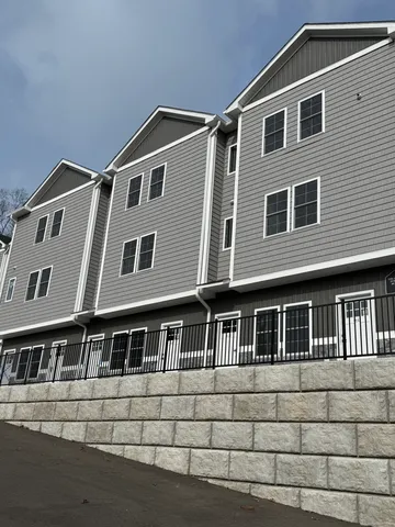 a front view of a house with windows