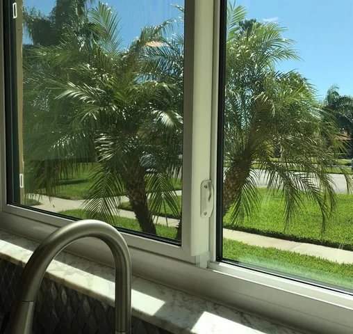 a view of an empty room and window