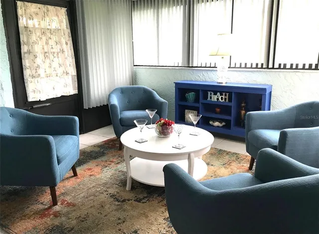 a kitchen with stainless steel appliances a stove a sink and a microwave