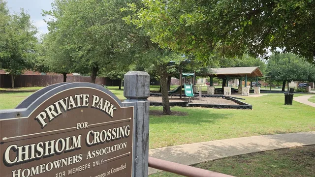 a view of a park with welcome board