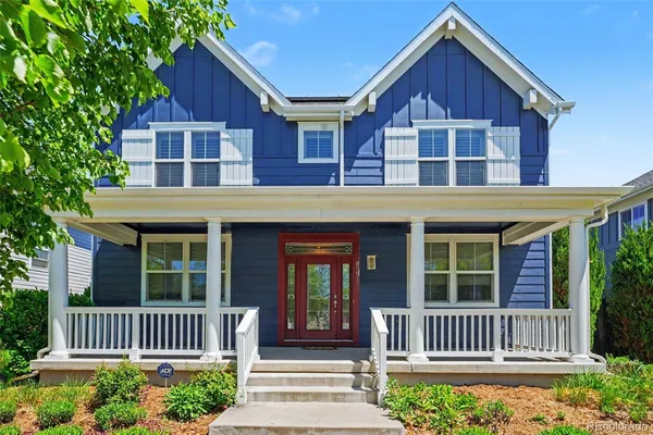 a front view of a house with a porch