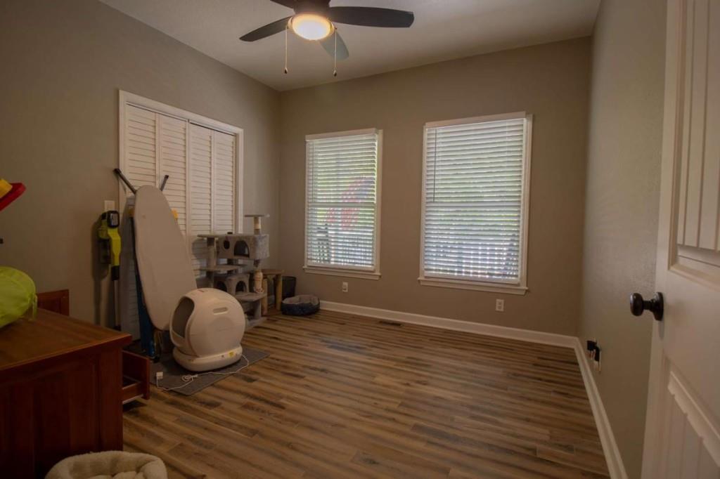 141 Chambers Mountain Road Mineral Bluff, GA 30559 - Photo 27 of 65 a view of a livingroom with furniture window and wooden floor
