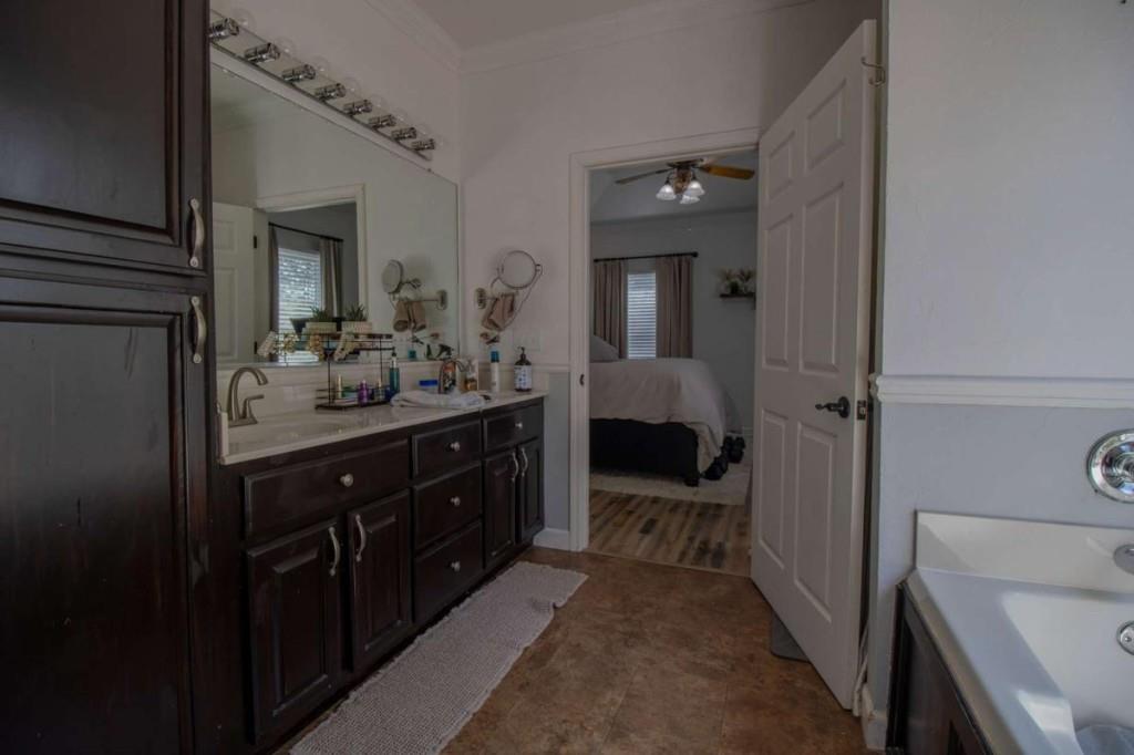 141 Chambers Mountain Road Mineral Bluff, GA 30559 - Photo 34 of 65 a bathroom with a sink a mirror and a toilet