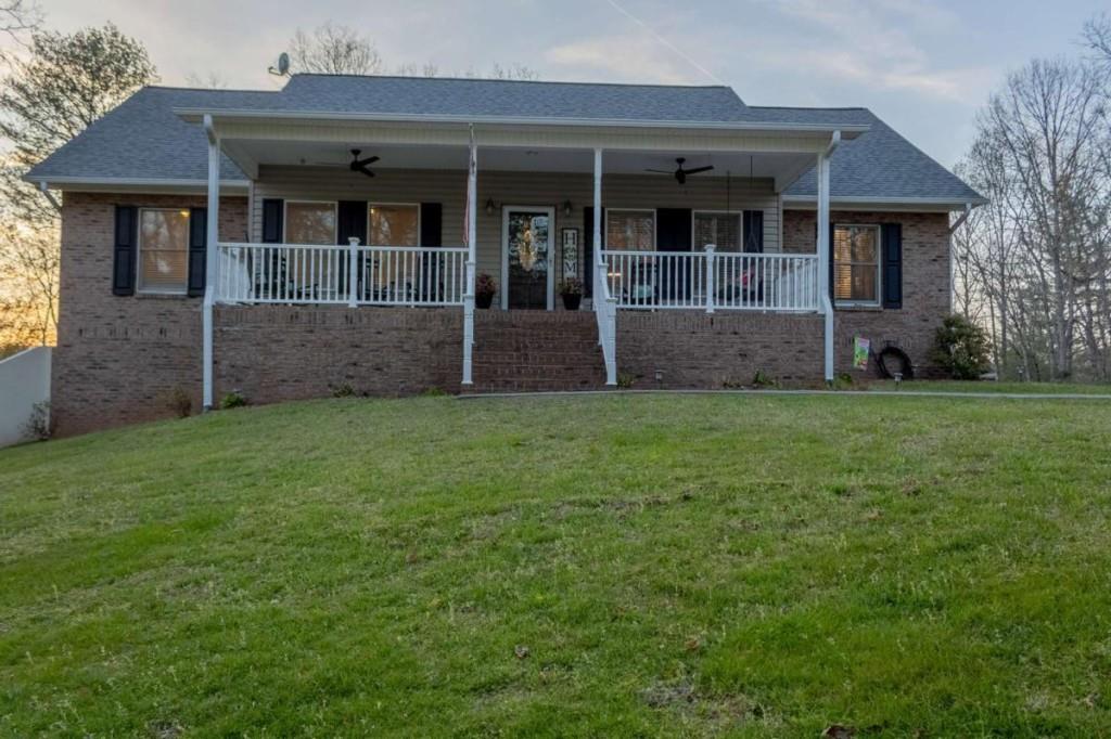 141 Chambers Mountain Road Mineral Bluff, GA 30559 - Photo 5 of 65 a view of front of house with yard