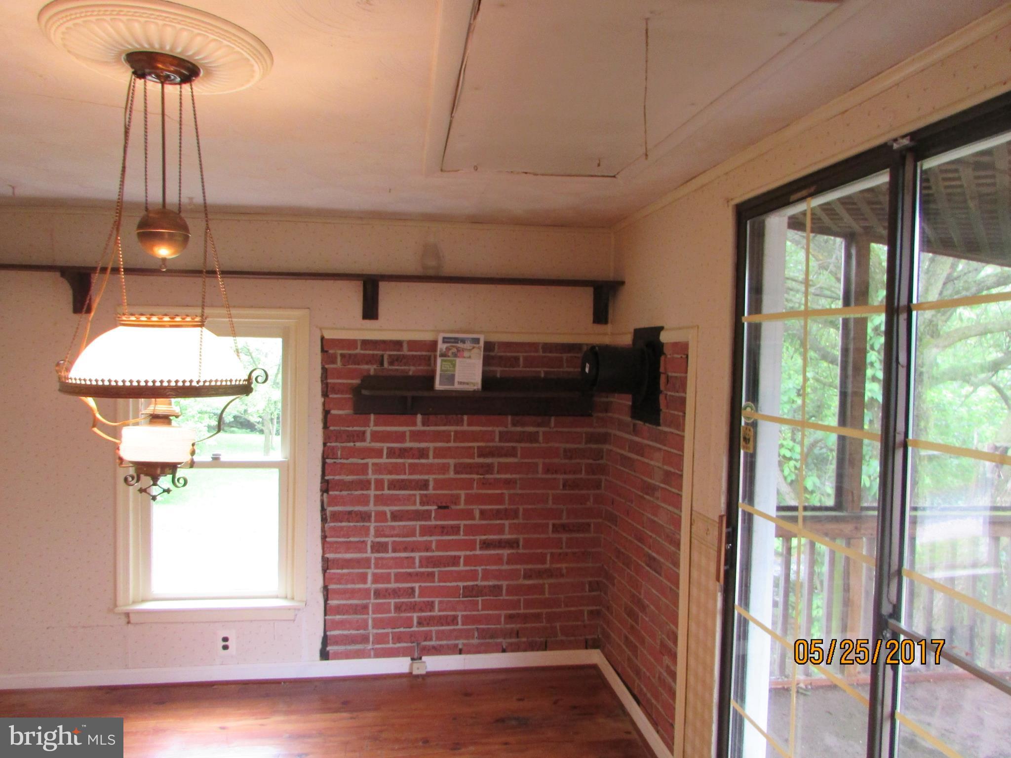 2632 Marston Road New Windsor, MD 21776 - Photo 14 of 30 Den slider to screened in deck