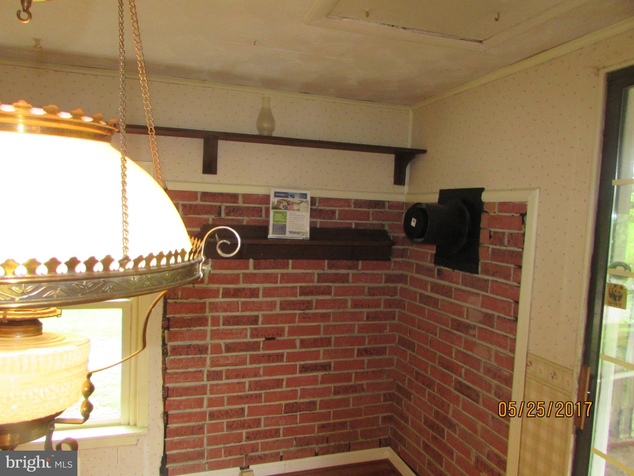 2632 Marston Road New Windsor, MD 21776 - Photo 15 of 30 Den with flue for woodstove