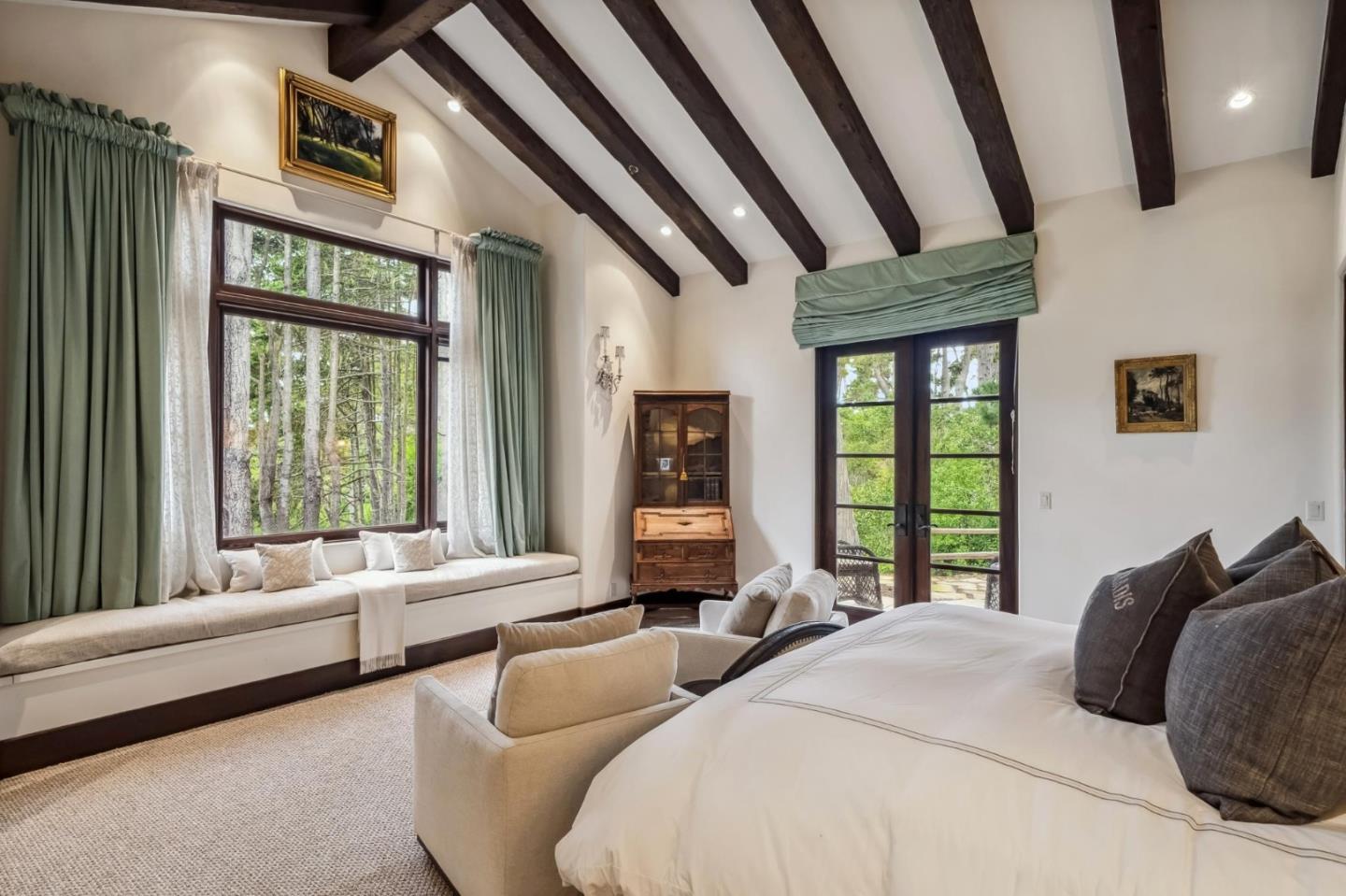 1425 Oleada Road Pebble Beach, CA 93953 - Photo 17 of 39 a bedroom with furniture and large windows