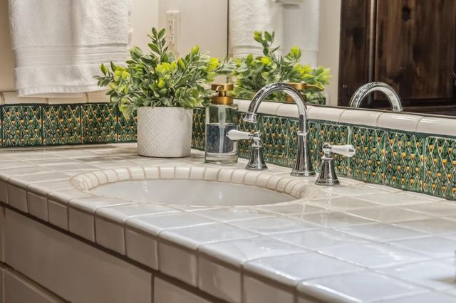 a view of a chair and table in the patio