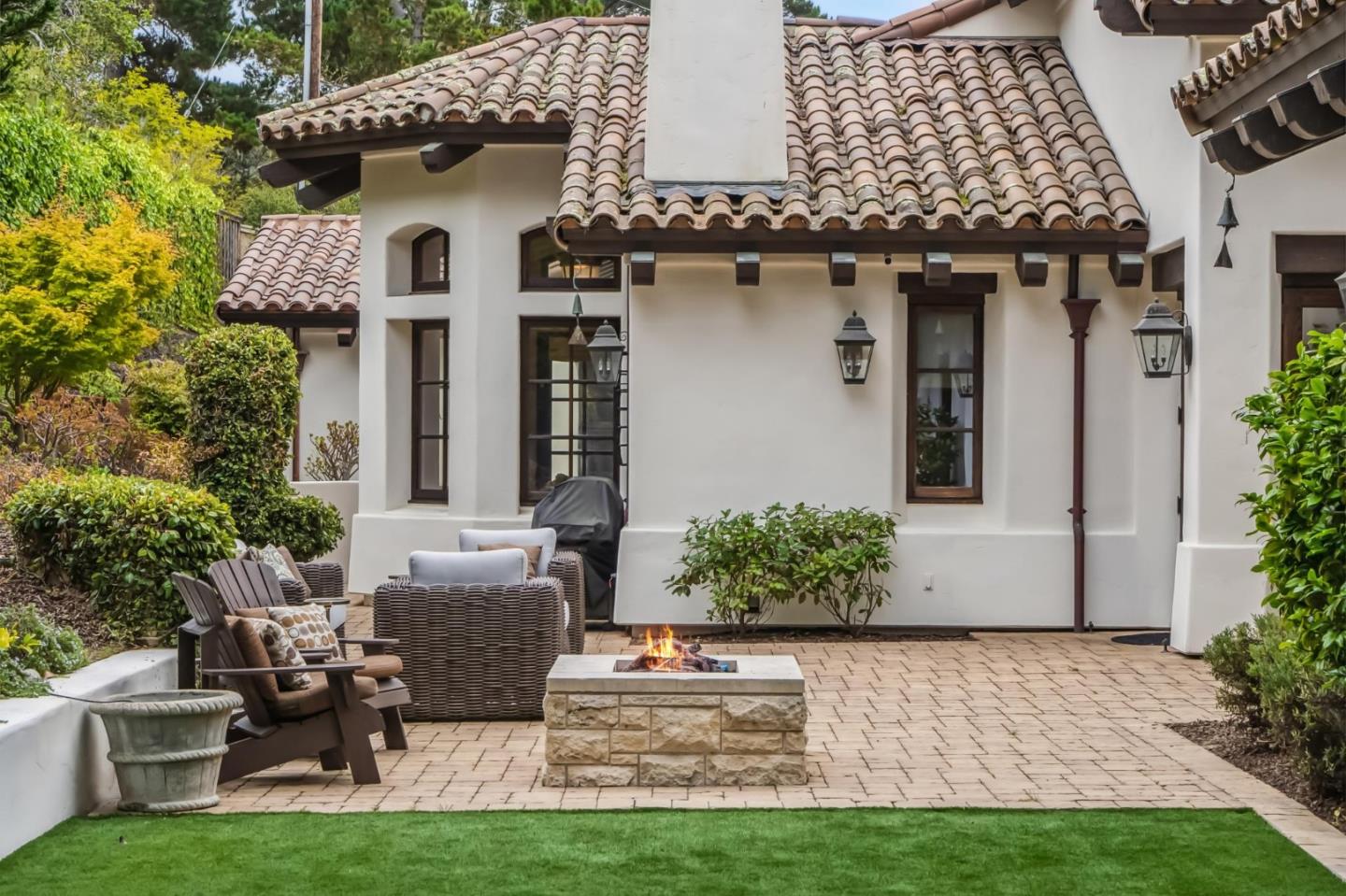 1425 Oleada Road Pebble Beach, CA 93953 - Photo 30 of 39 a front view of a house with garden