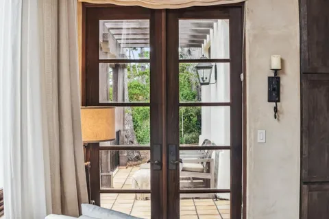 a view of a room with a large window