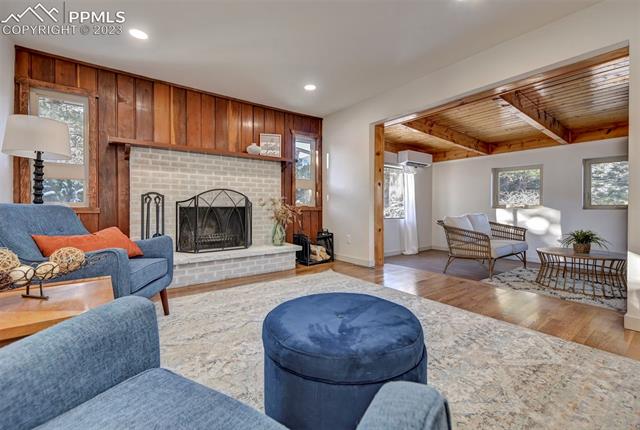 152 Clarksley Road Manitou Springs, CO 80829 - Photo 7 of 33 Living Room and sunroom