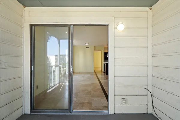 a view of balcony with a tree