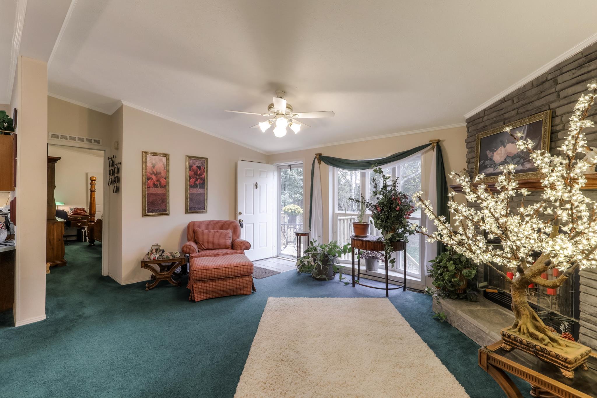 2981 Simmons Bluff Road Lebanon, TN 37090 - Photo 8 of 25 a living room with furniture and a fireplace