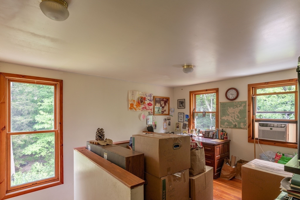 425 Dingle Road Worthington, MA 01098 - Photo 14 of 32 a view of a workspace with furniture and a window