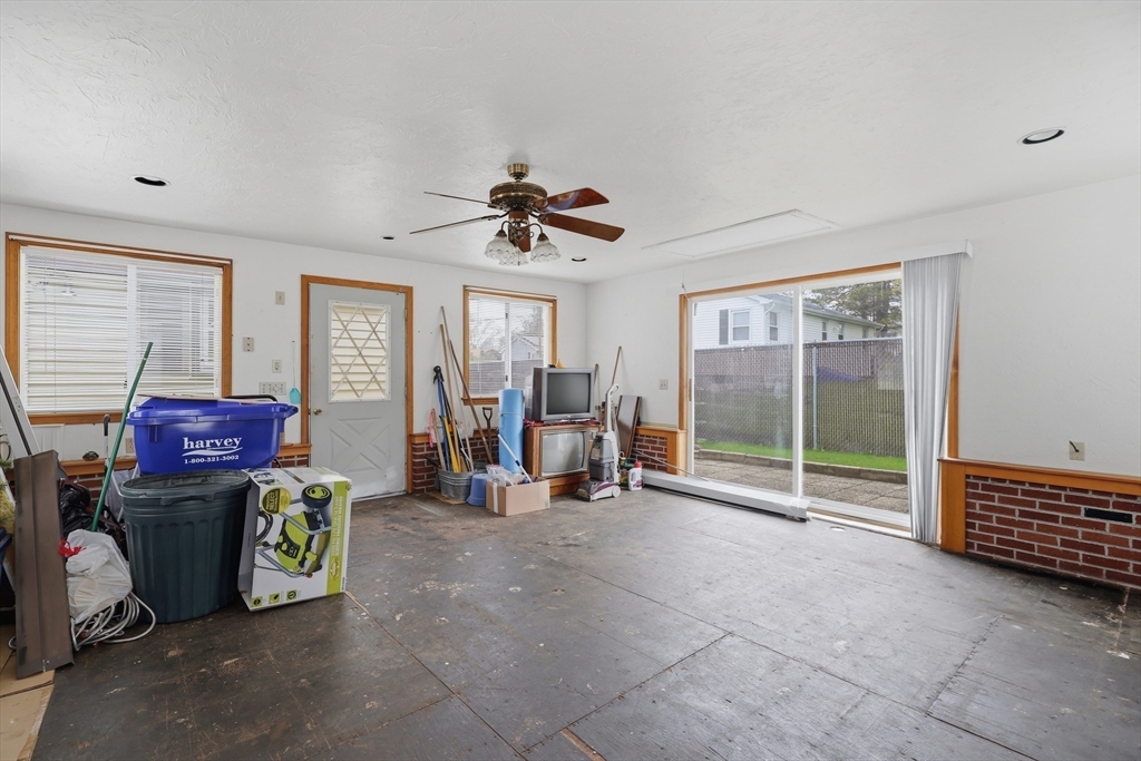 10 Deluca Road Milford, MA 01757 - Photo 34 of 37 a view of a room with gym equipment and a large window