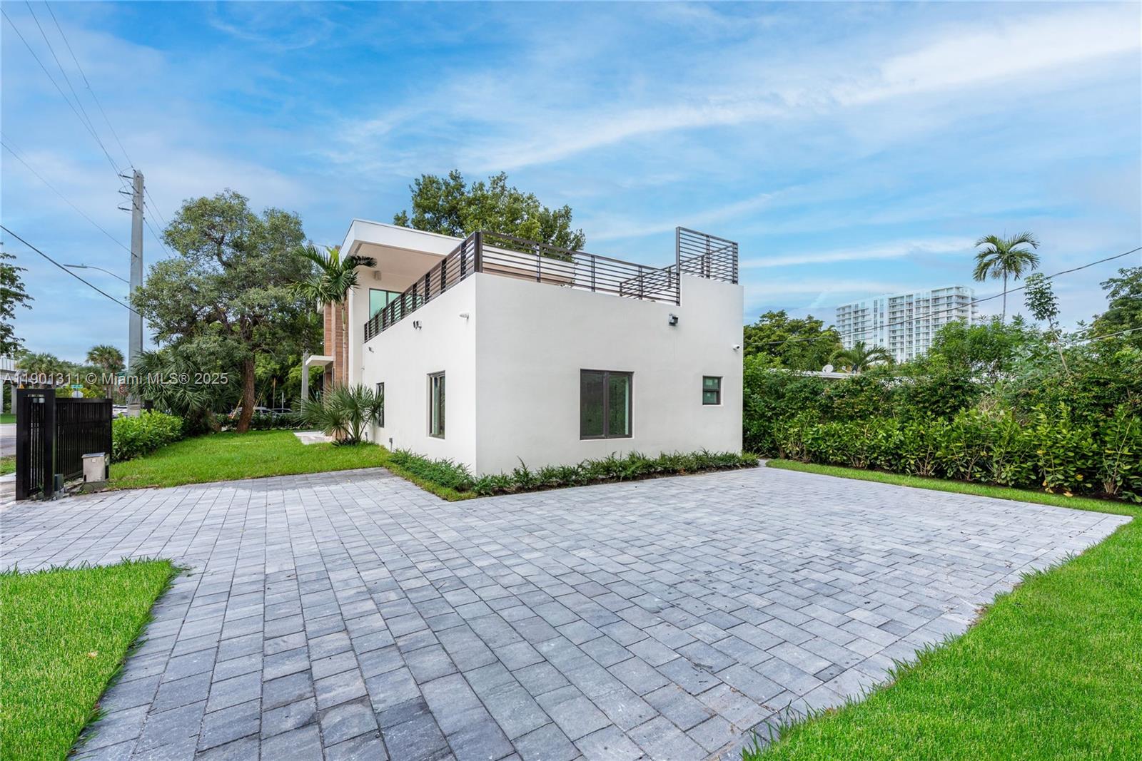 101 Southwest 25th Road Miami, FL 33129 - Photo 2 of 35 a view of a house with a yard