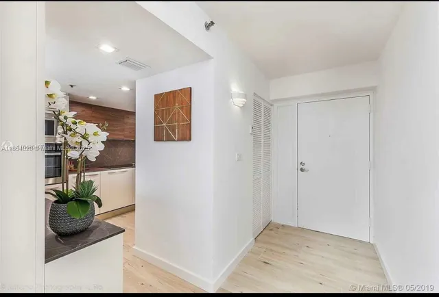 a view of livingroom with wooden floor