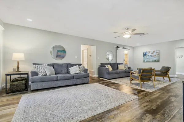 a living room with furniture and a couch