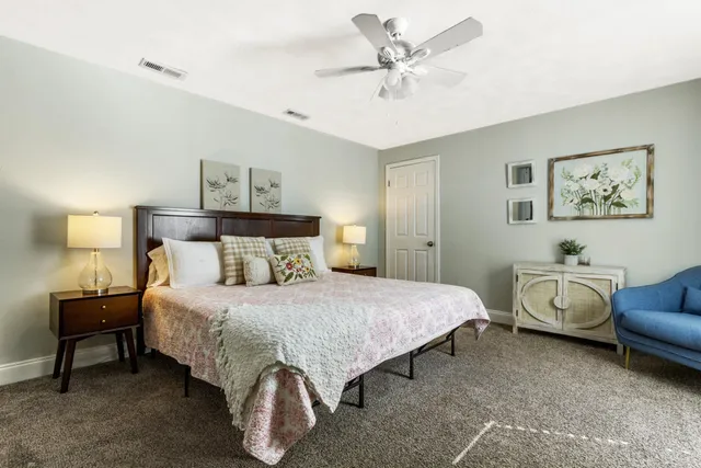 a bathroom with a sink vanity and a mirror