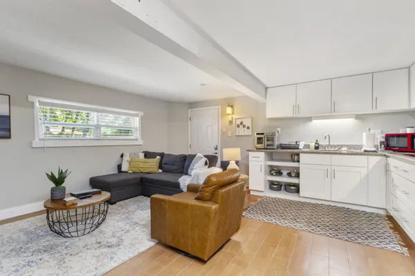 a living room with furniture and a table