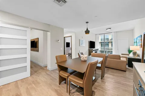 a view of a dining room with furniture