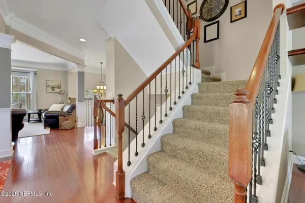 a en suite bathroom with a sink double vanity and a mirror