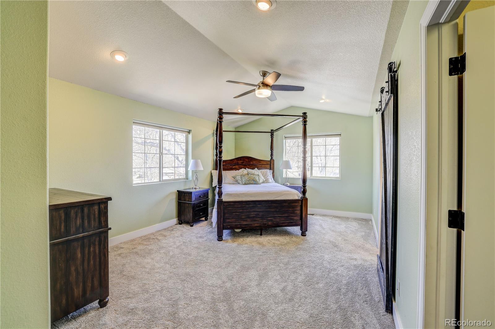 4530 Quitman Street Denver, CO 80212 - Photo 20 of 40 a bedroom with bed and window