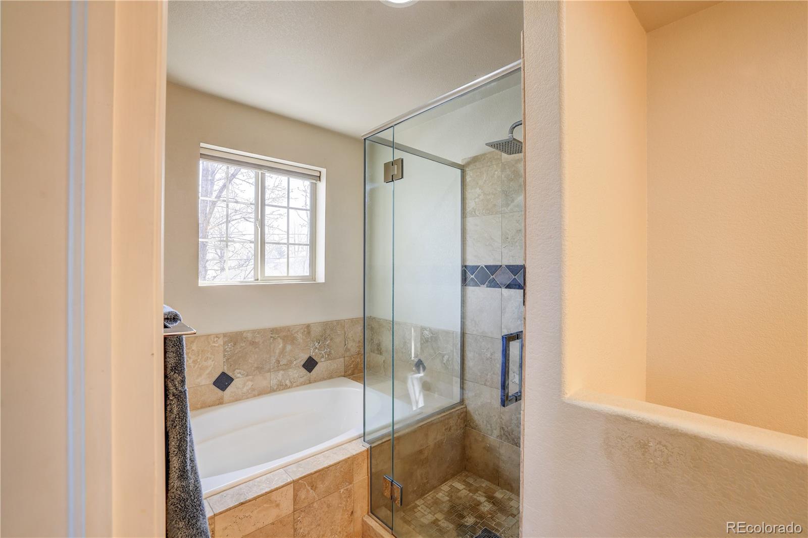 4530 Quitman Street Denver, CO 80212 - Photo 24 of 40 a bathroom with a bathtub and a shower